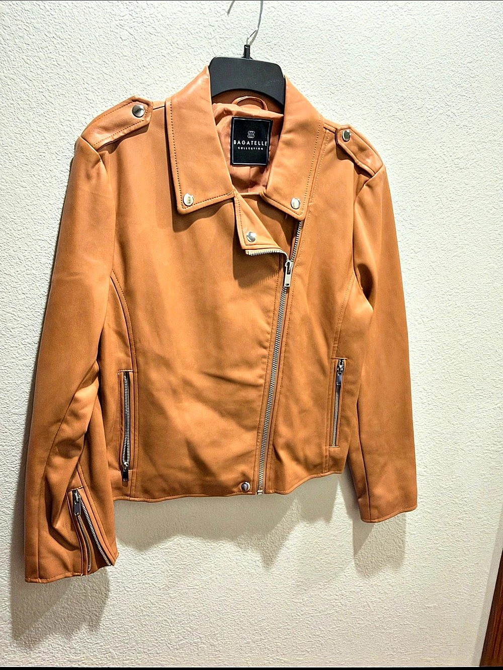 Light Brown Leather Moto Jacket with silver zippers and snaps, NEW.